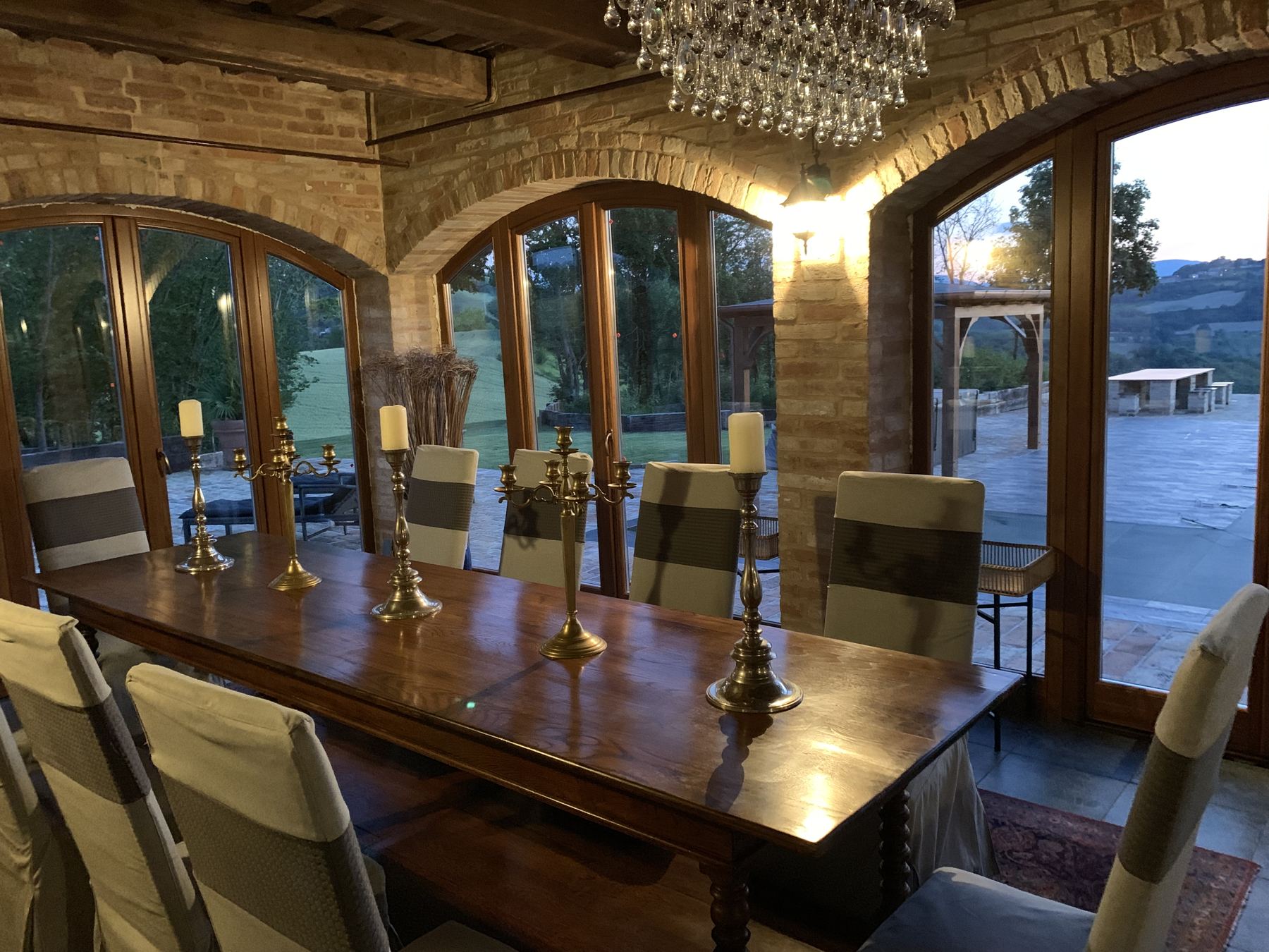 Dining room beneath arched windows