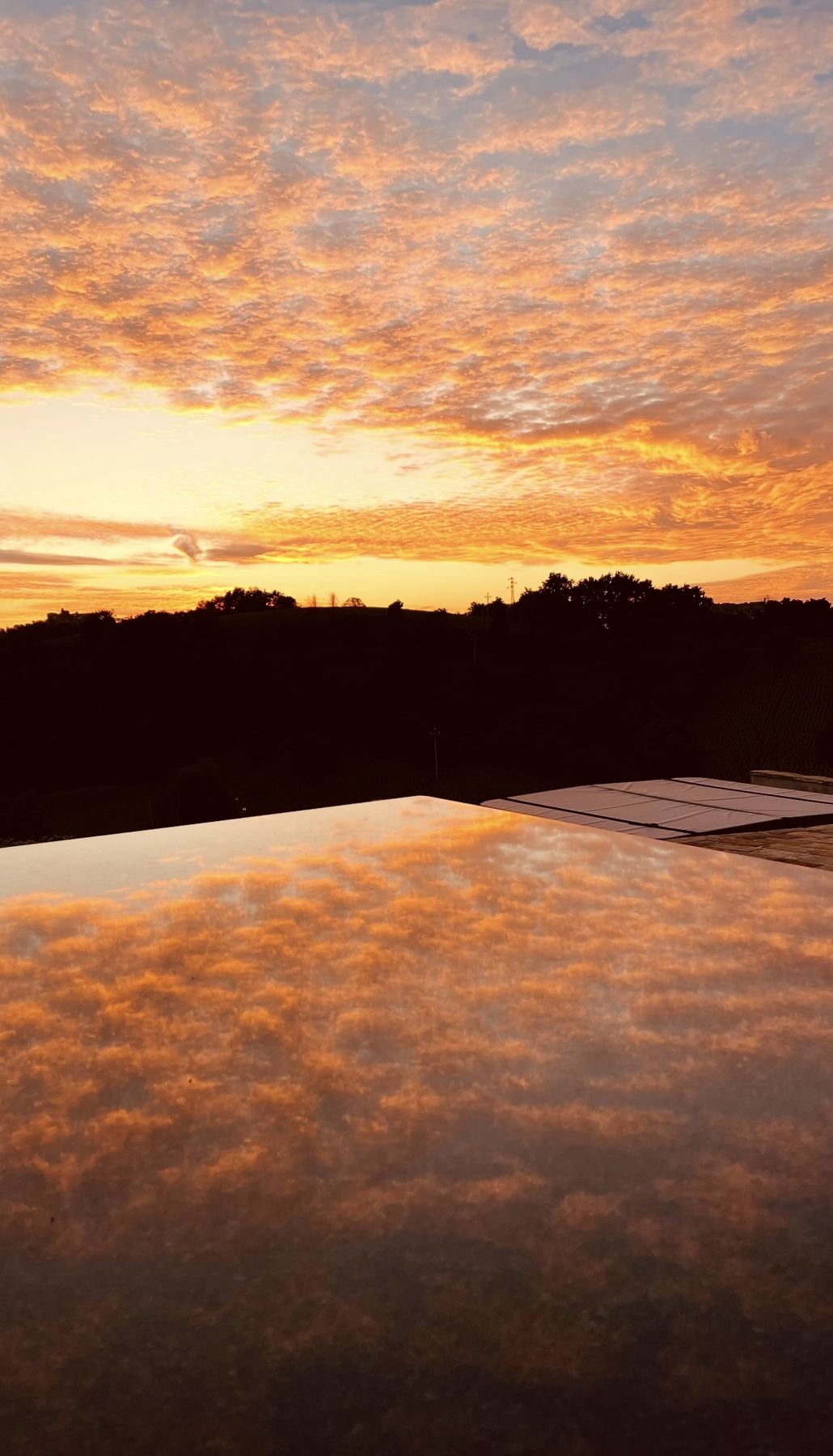Sunset reflected in the pool