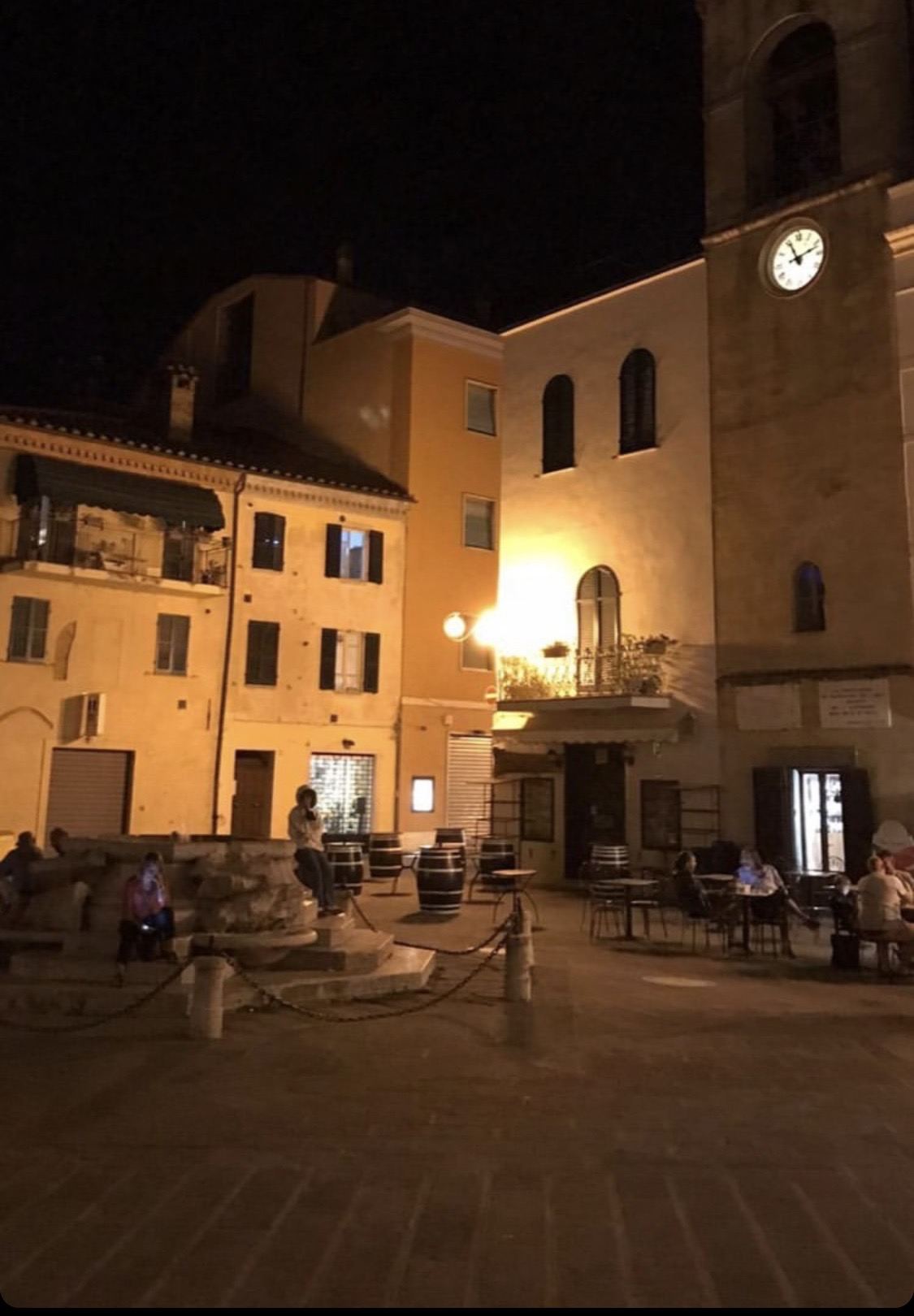 A hill town piazza at night